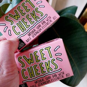 pink cardboard case labelled sweet cheek natural soap with rose geranium essential oil