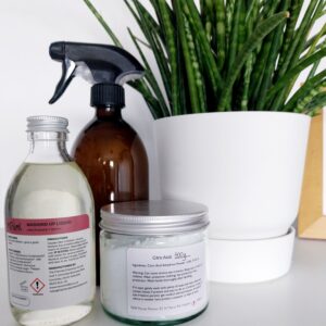 ingredients to make nancy birtwhistle's pure magic including eco washing up liquid, citric acid and spray bottle