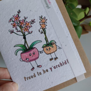 plantable wildflower seed card with text proud to be your kid with images of older plant pot character next to smaller plant pot character