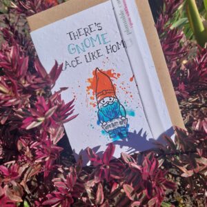 Plantable seed card with picture of gnome and wording there's no place like home moving house greeting card