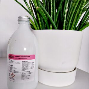 miniml refills pink dragonfruit and orchid fabric conditioner in reusable glass bottle with aluminium lid